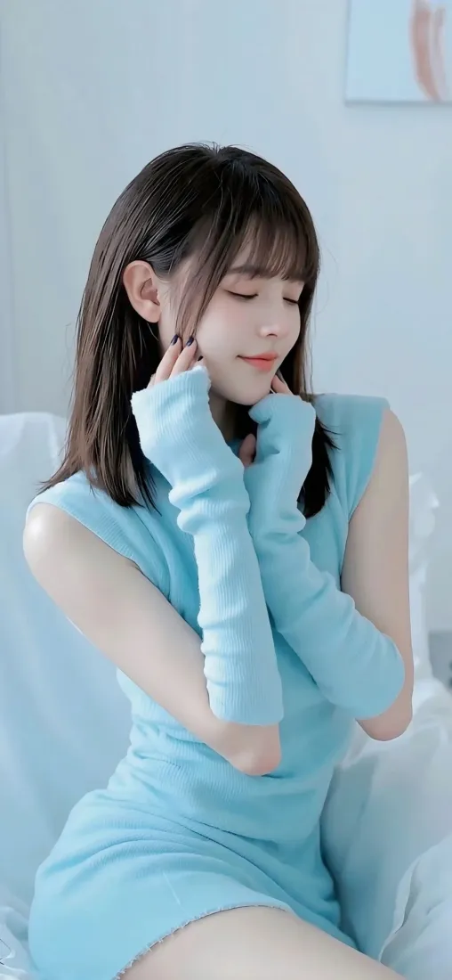 蓝衣美女手机壁纸｜浅蓝色背景图 - 居家时尚「哲风壁纸」