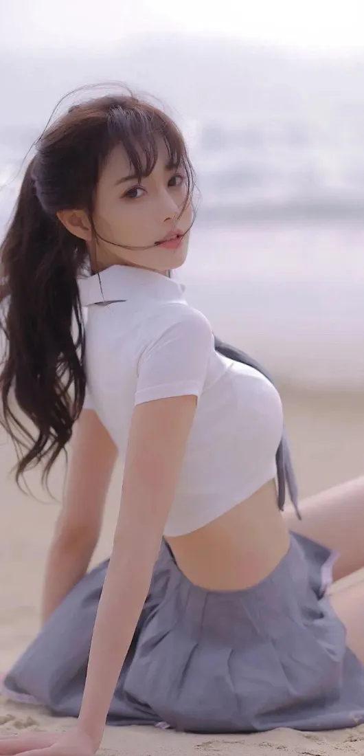 美女海滩手机壁纸｜海边背景图片 - 白衣短裙「哲风壁纸」