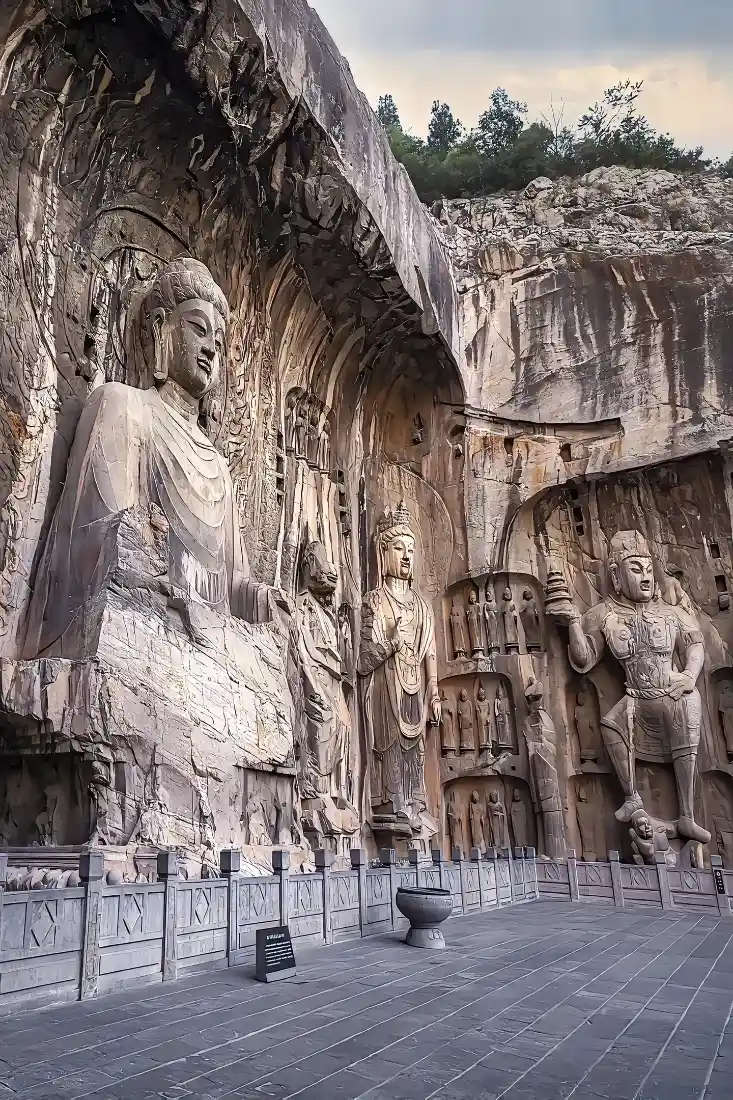 龙门石窟手机壁纸｜石窟背景图片 - 佛像石刻「哲风壁纸」