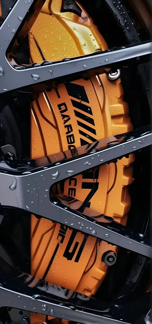 汽车轮胎手机壁纸｜汽车轮毂背景图片 - 橙色机械部件「哲风壁纸」