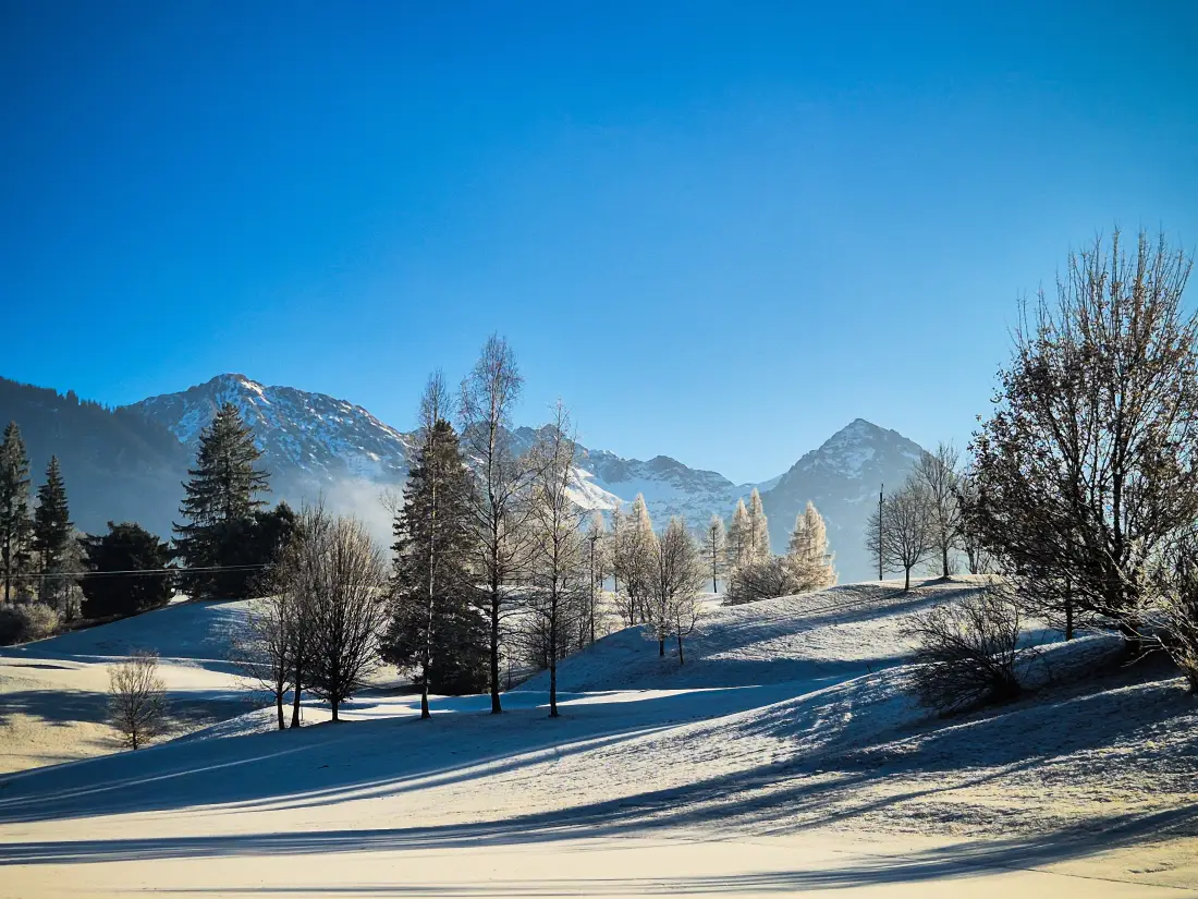 4k自然风景壁纸｜雪景背景图片 - 山峰阳光蓝天「哲风壁纸」