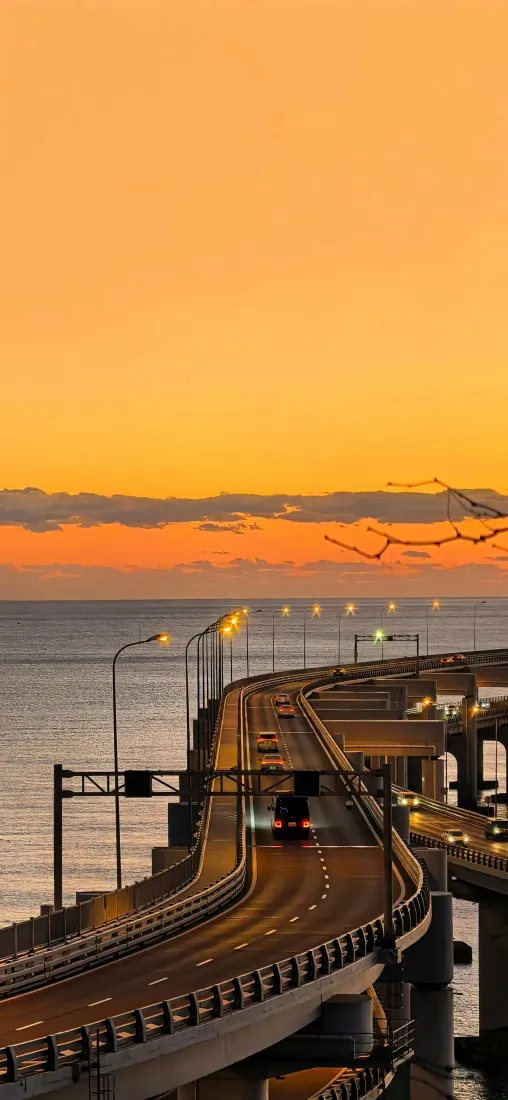 晚霞手机壁纸｜海滨背景图片 - 高架桥「哲风壁纸」